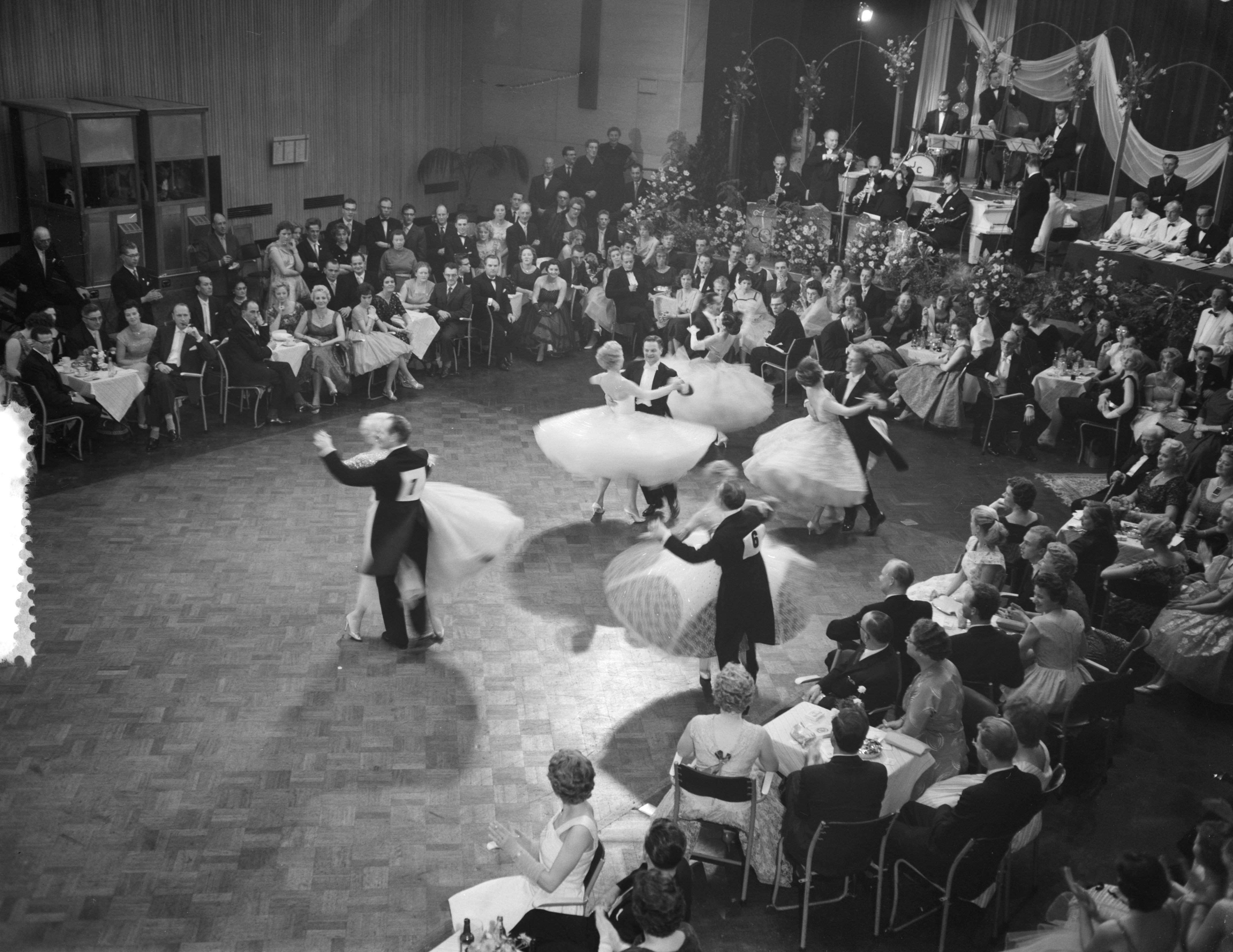 Historical black and white photograph of a ballroom dance competition